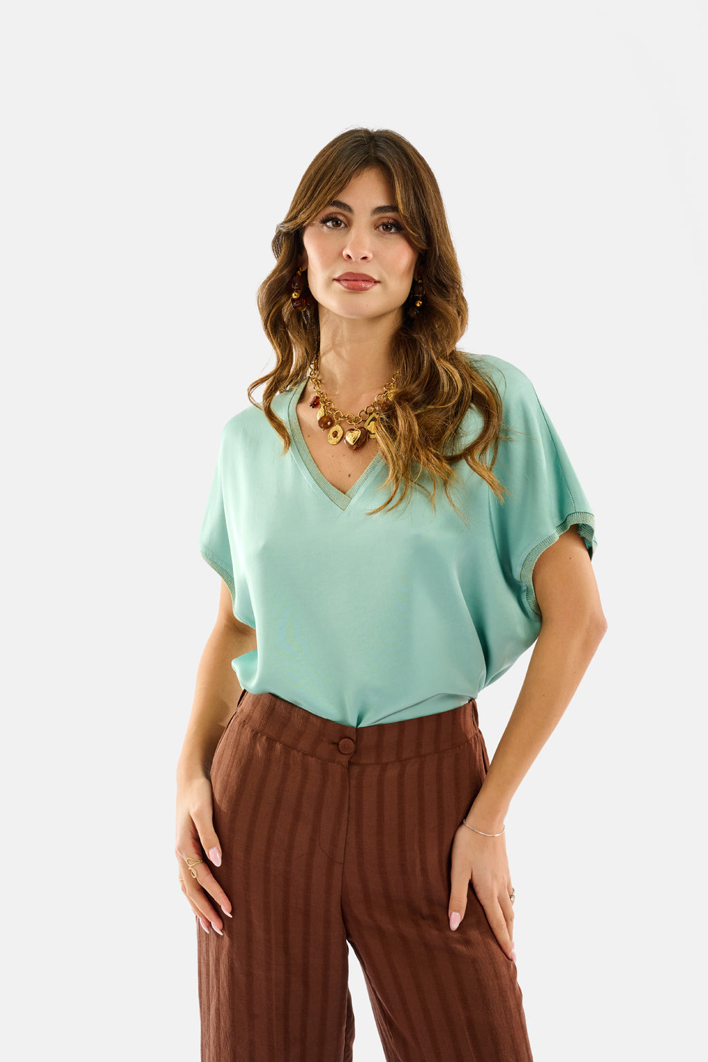 Blusa scollo V dettagli costina