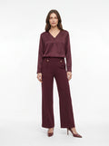Pantalone nervine e bottoni decorativi