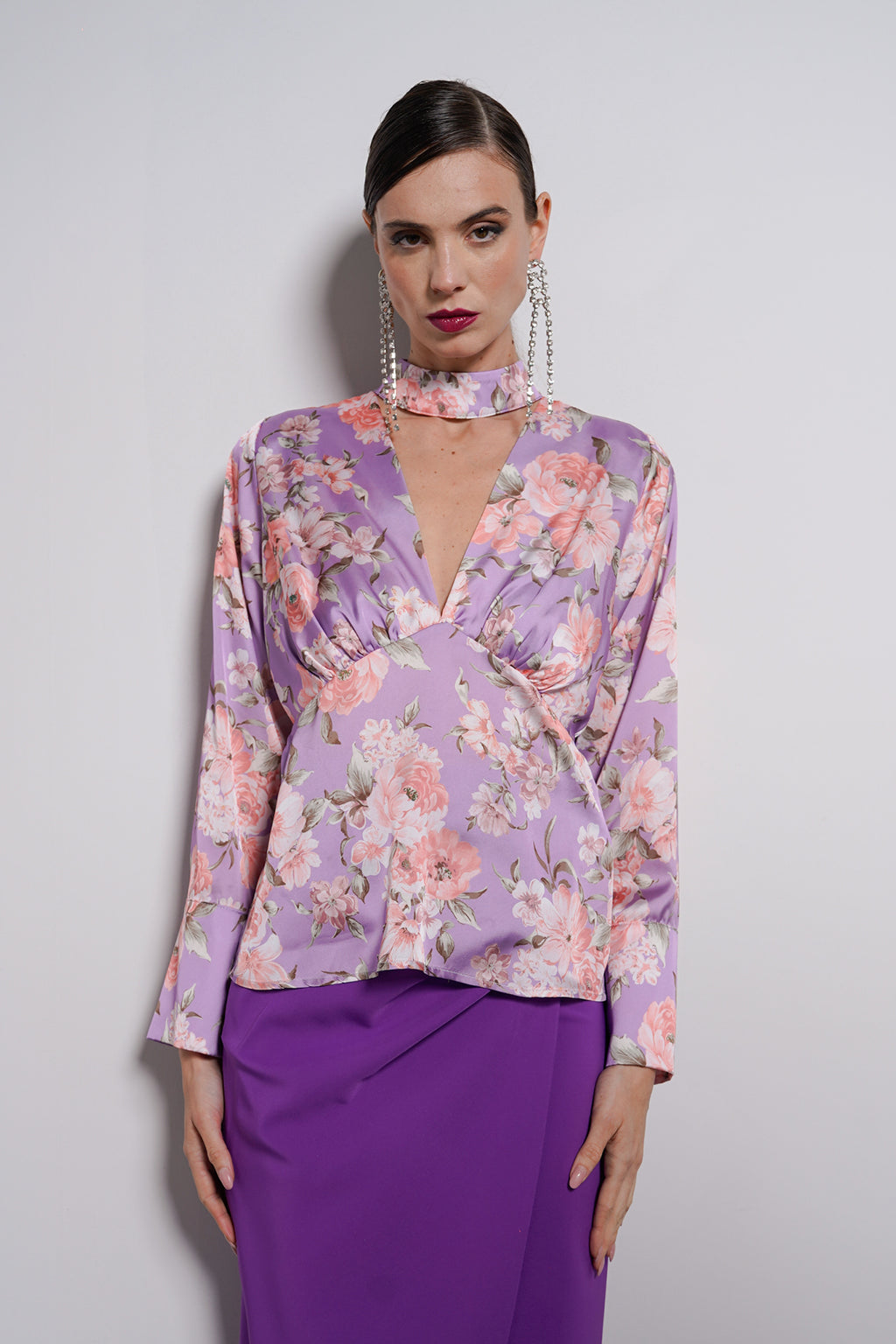 Blusa collo anello