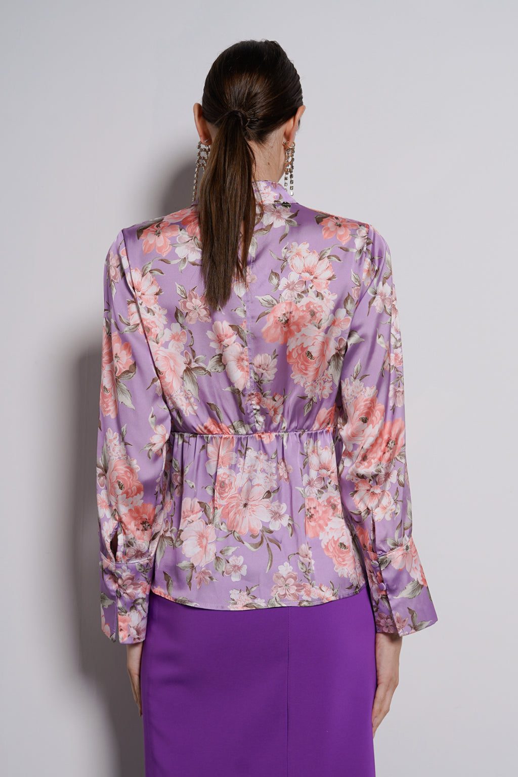 Blusa collo anello