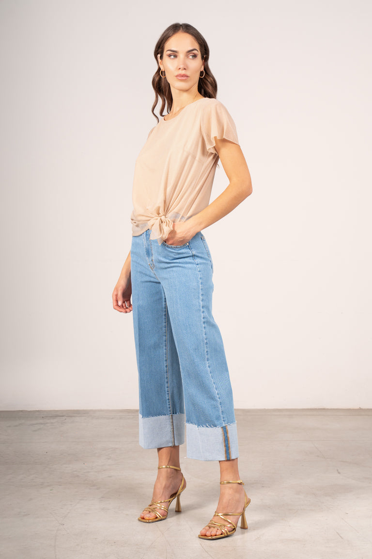 Jeans con piegone