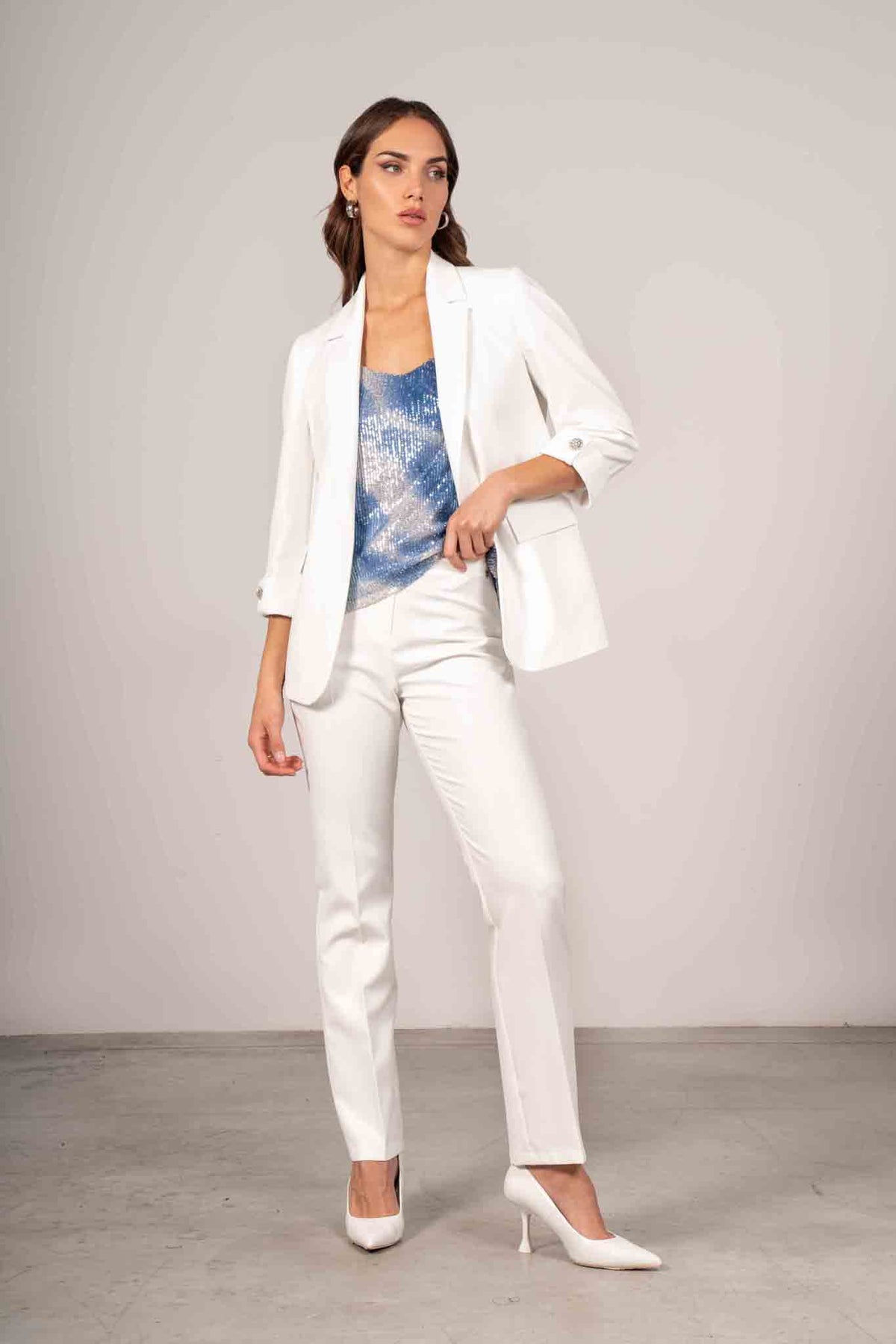 Pantalone con bottone gioiello