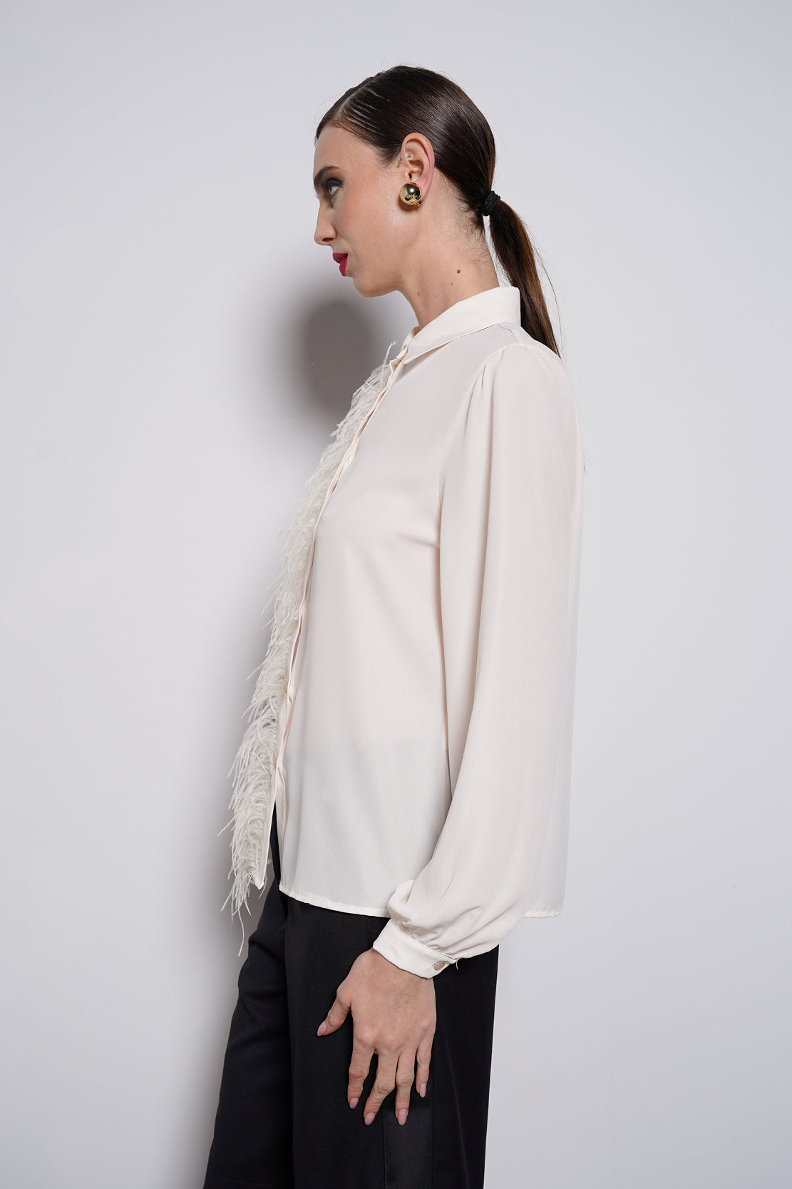 Camicia piume