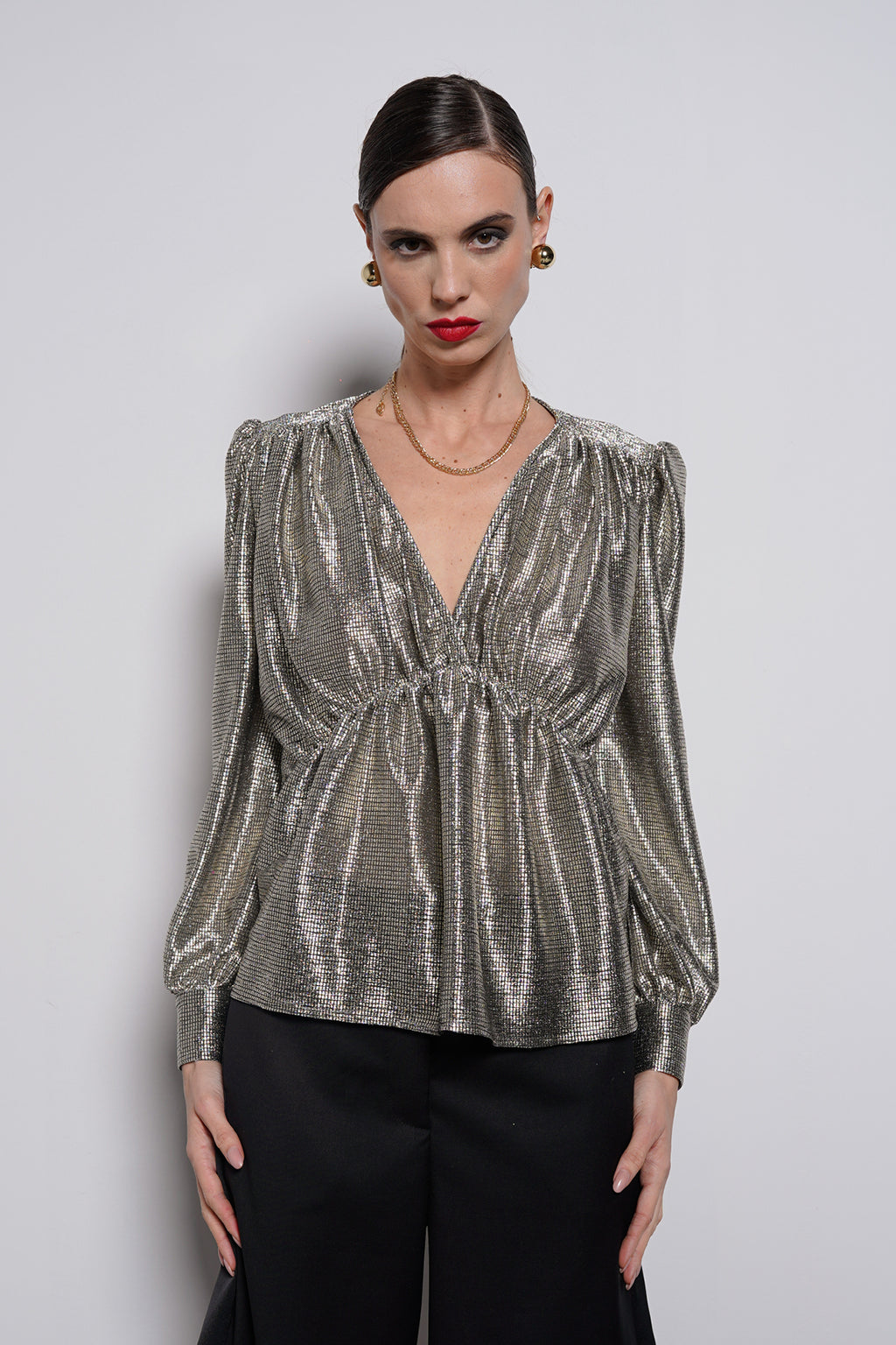 Blusa tessuto laminato