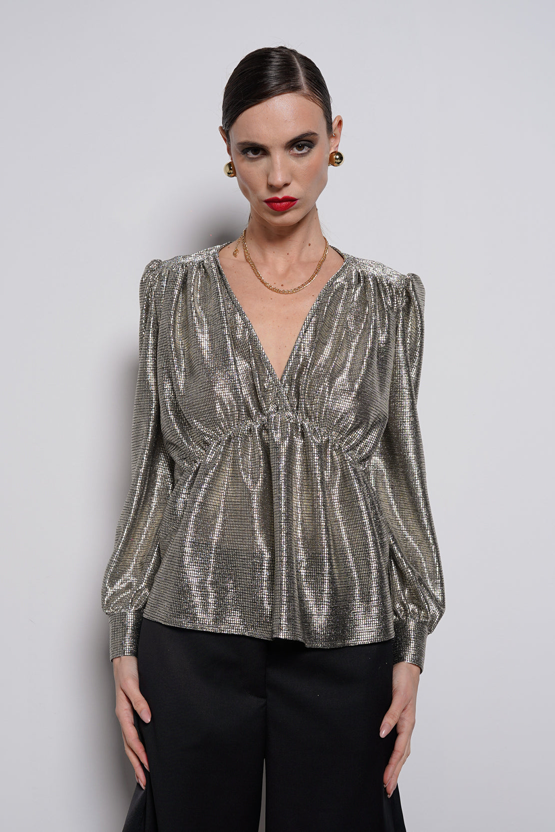Blusa tessuto laminato