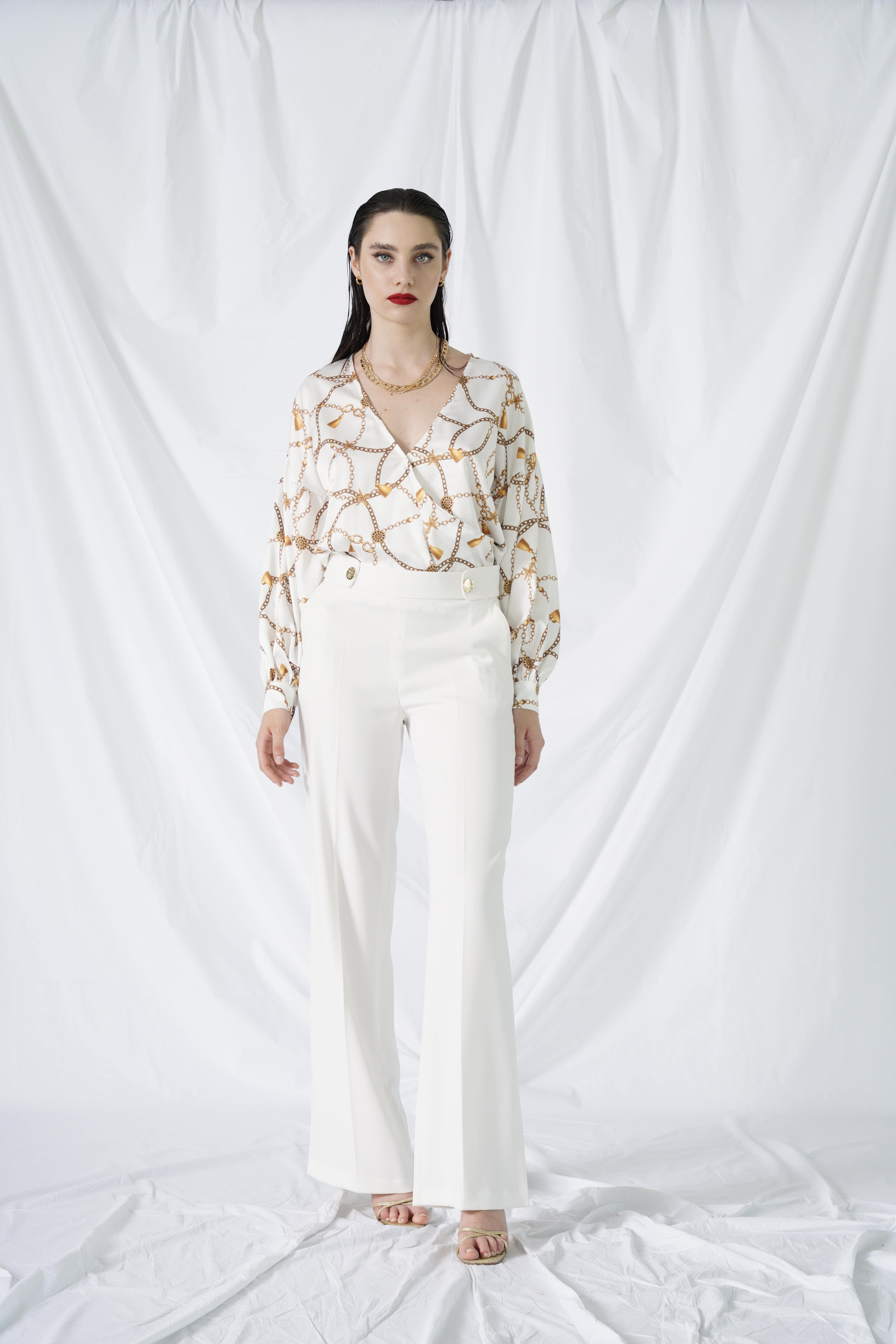 Pantalone con bottoni