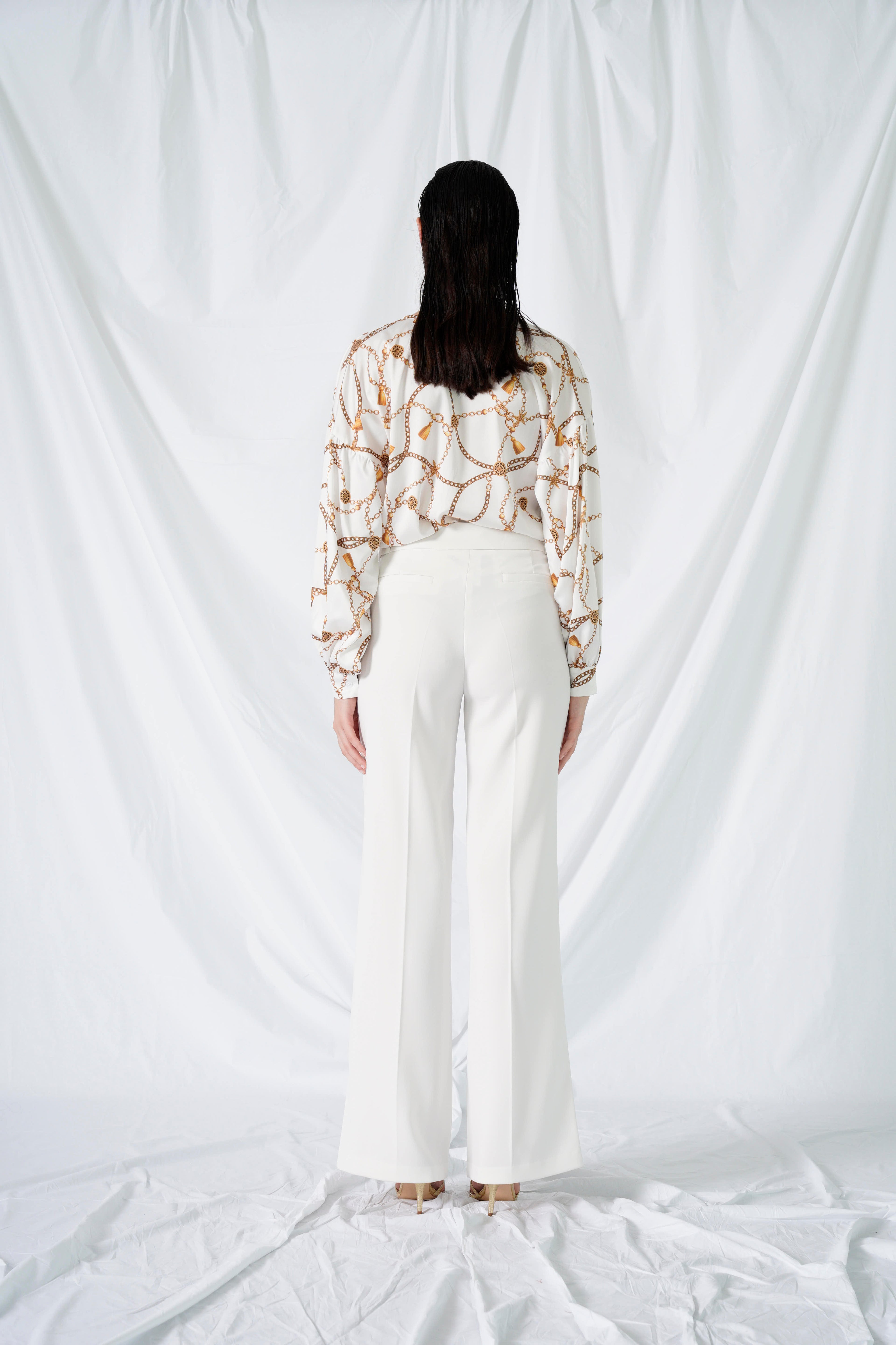 Pantalone con bottoni