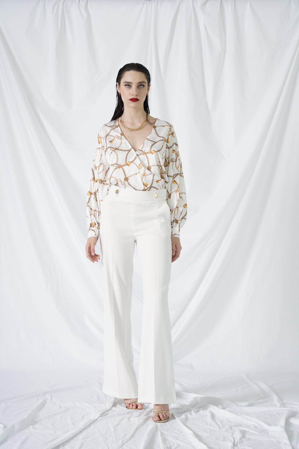 Pantalone con bottoni