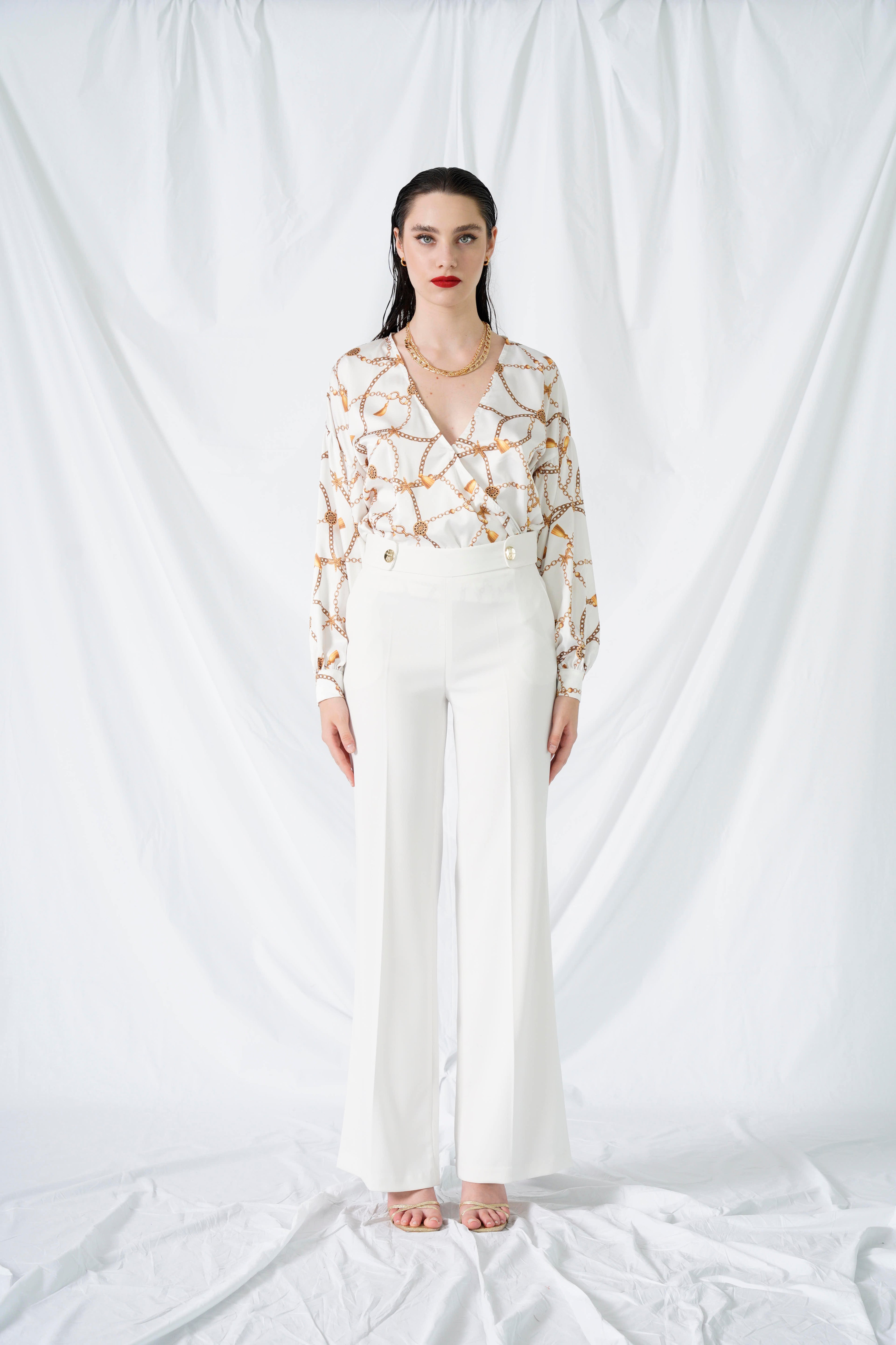 Pantalone con bottoni