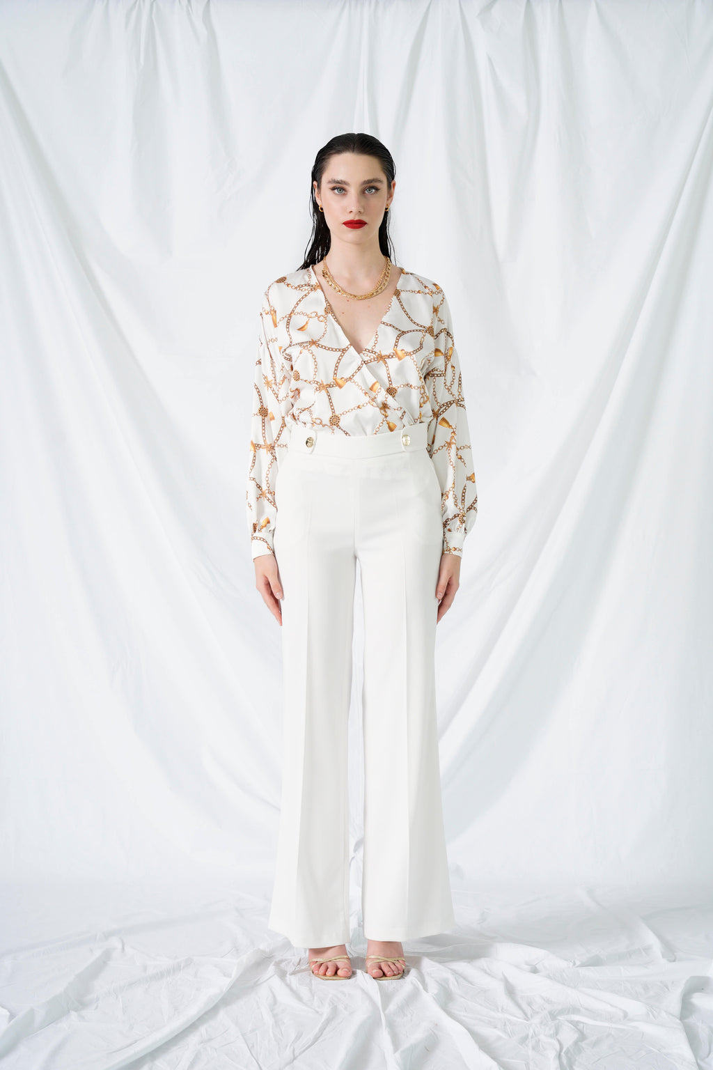 Pantalone con bottoni