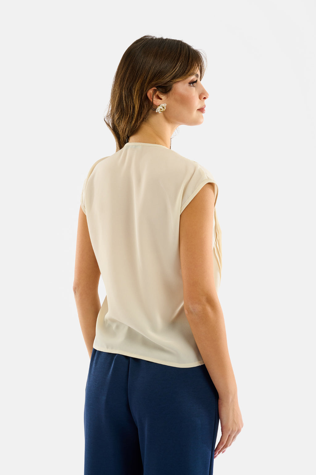 Blusa smanicata con volant