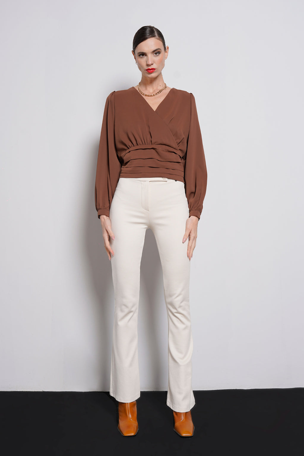 Blusa con fascione