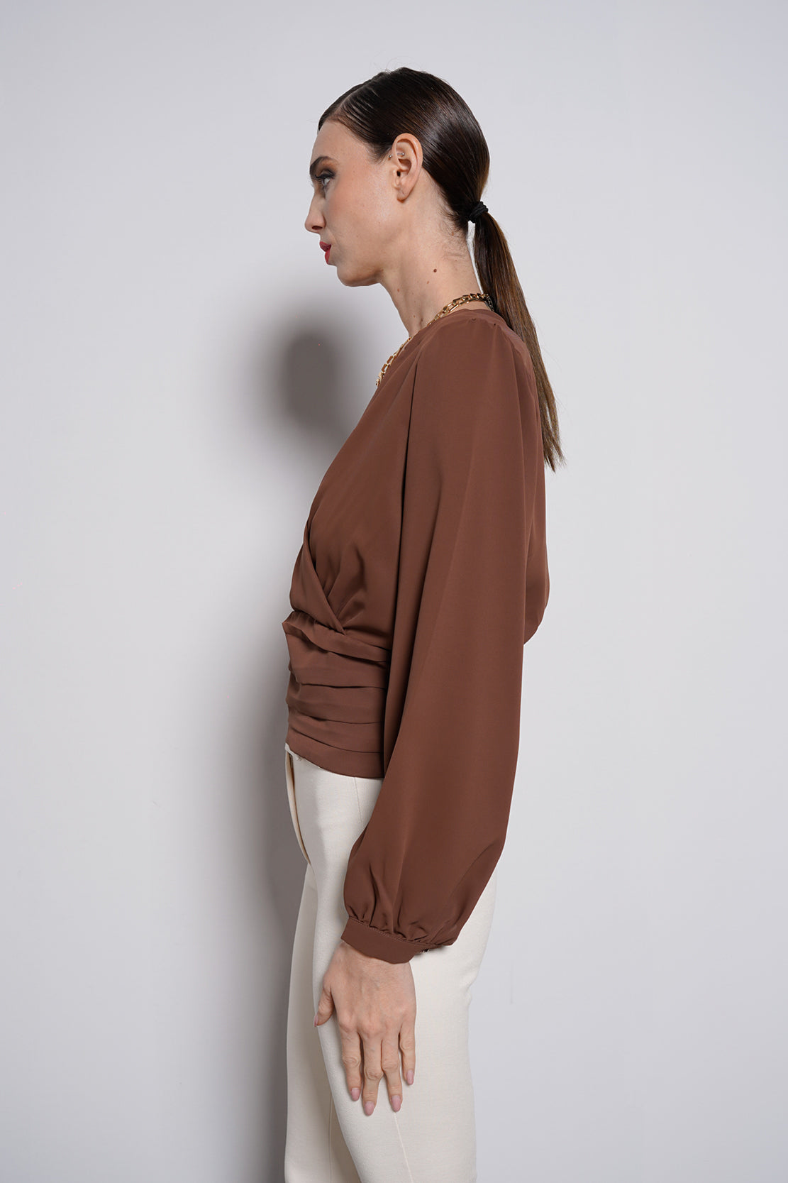 Blusa con fascione