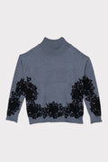 Pullover con macrame'