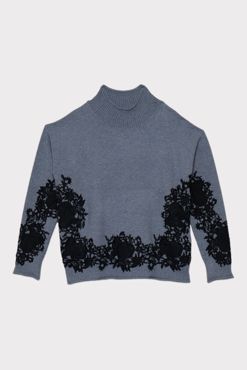 Pullover con macrame'