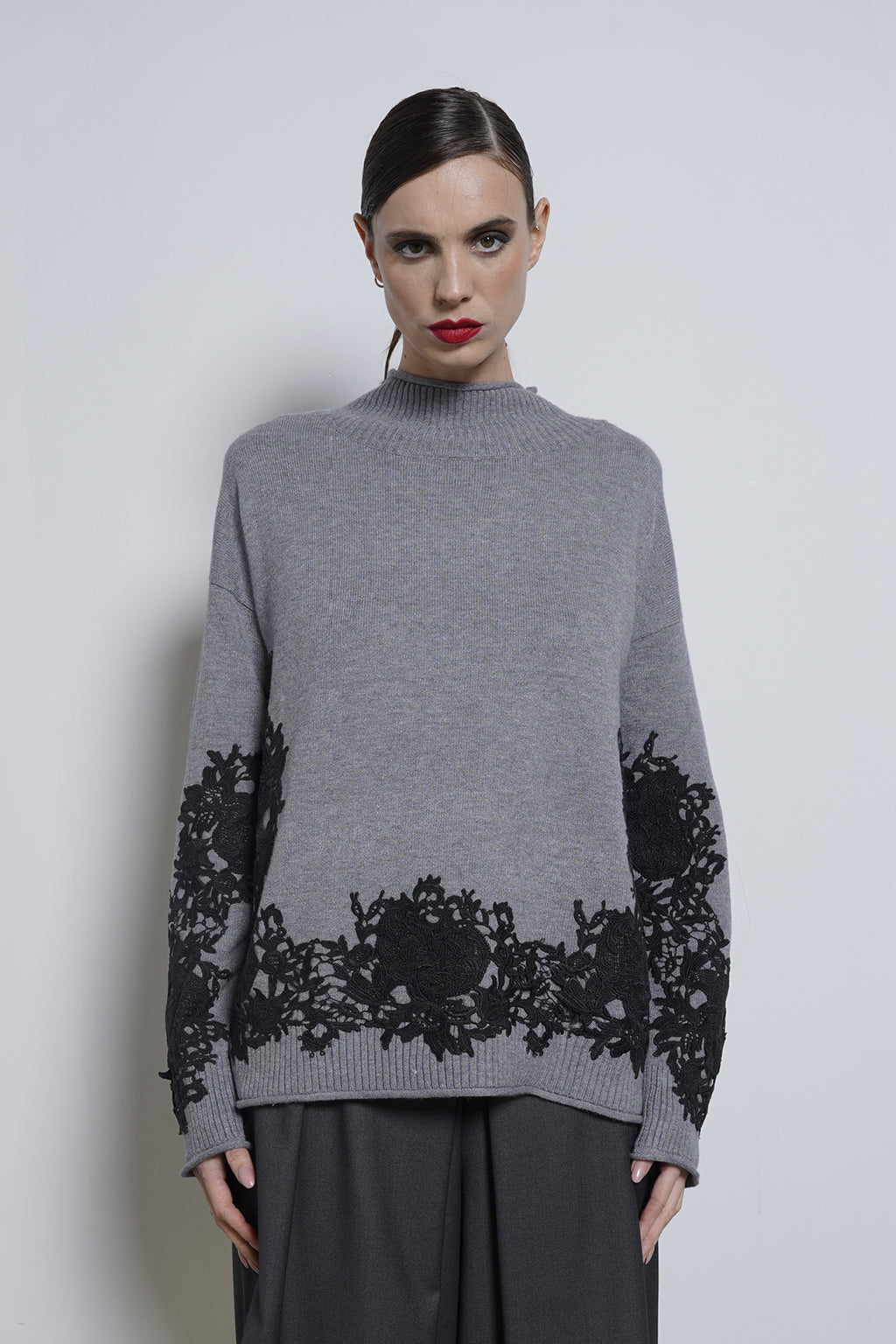 Pullover con macrame'