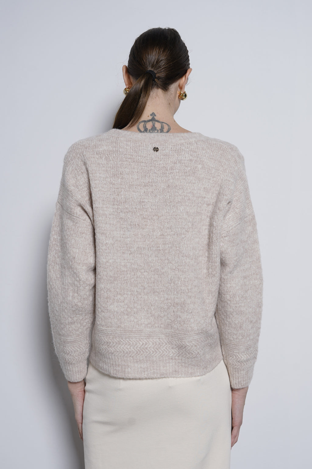 Pullover con nappine