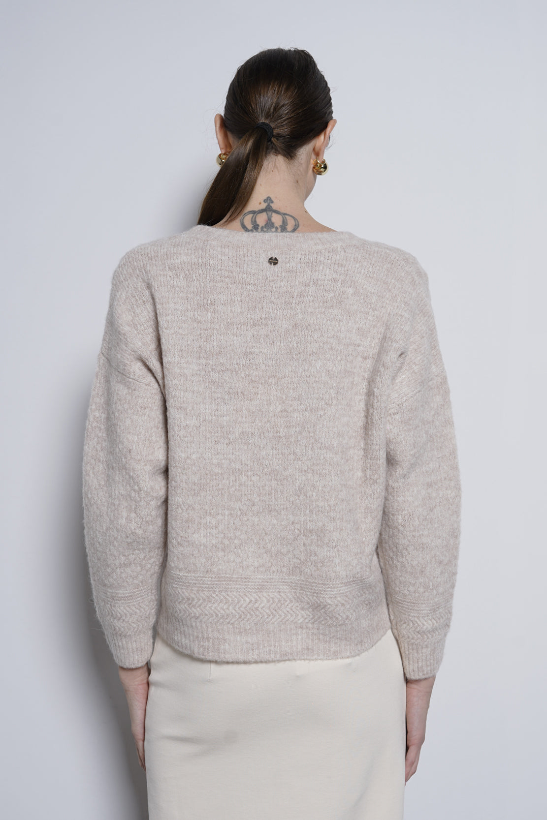 Pullover con nappine
