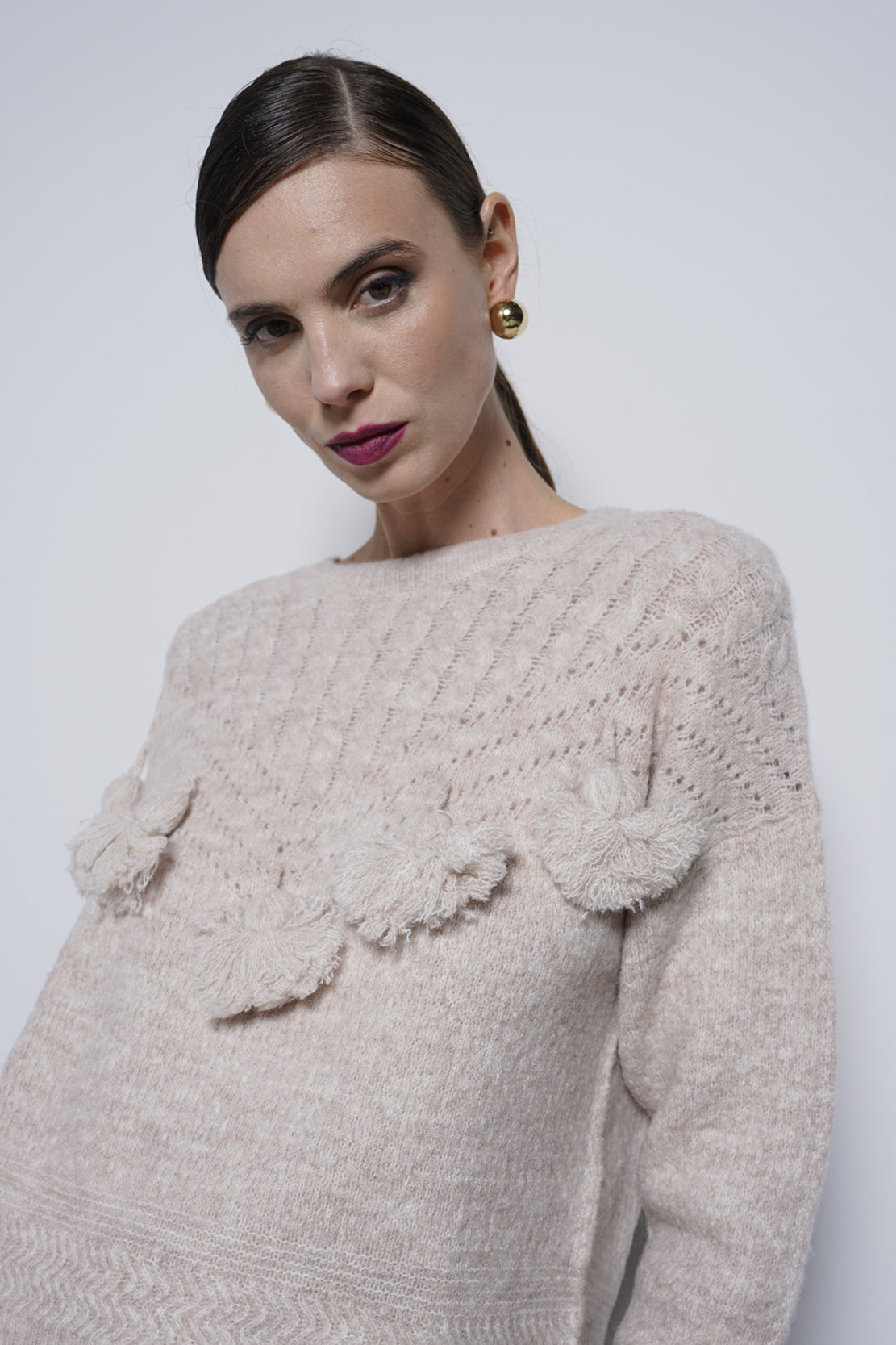 Pullover con nappine
