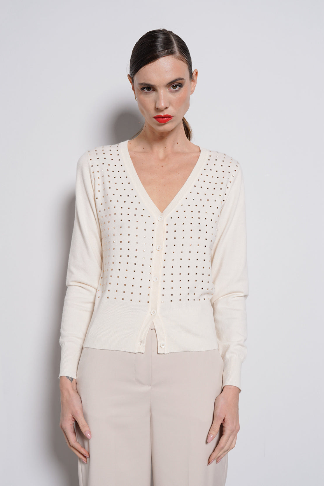 Cardigan con borchie