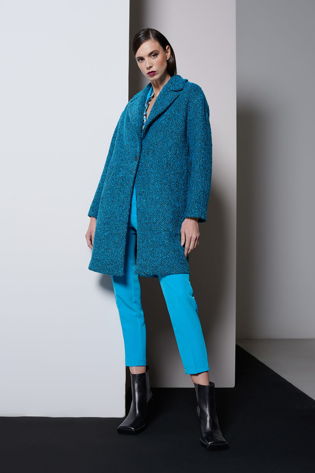 Cappotto tessuto spigato