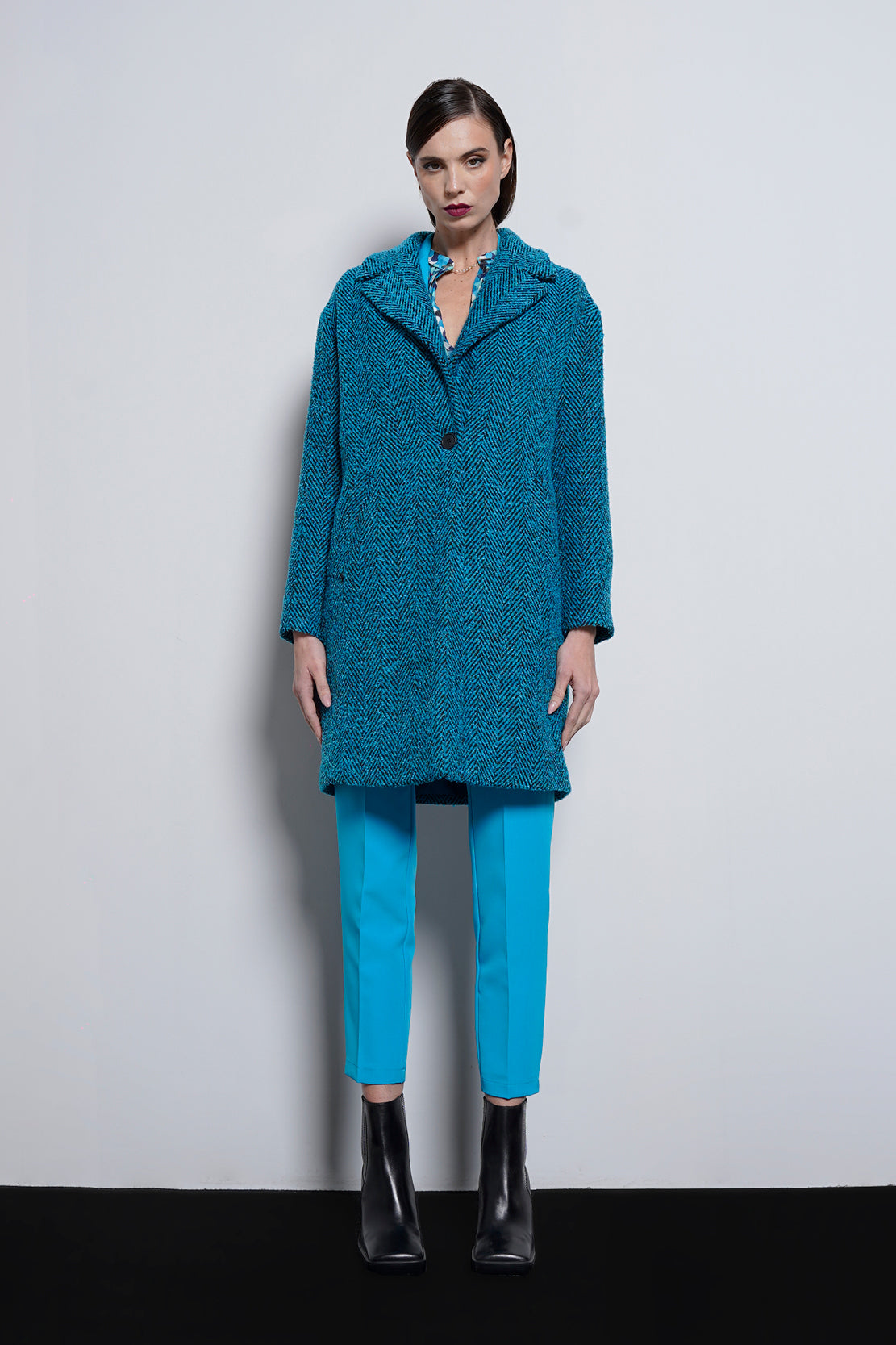Cappotto tessuto spigato