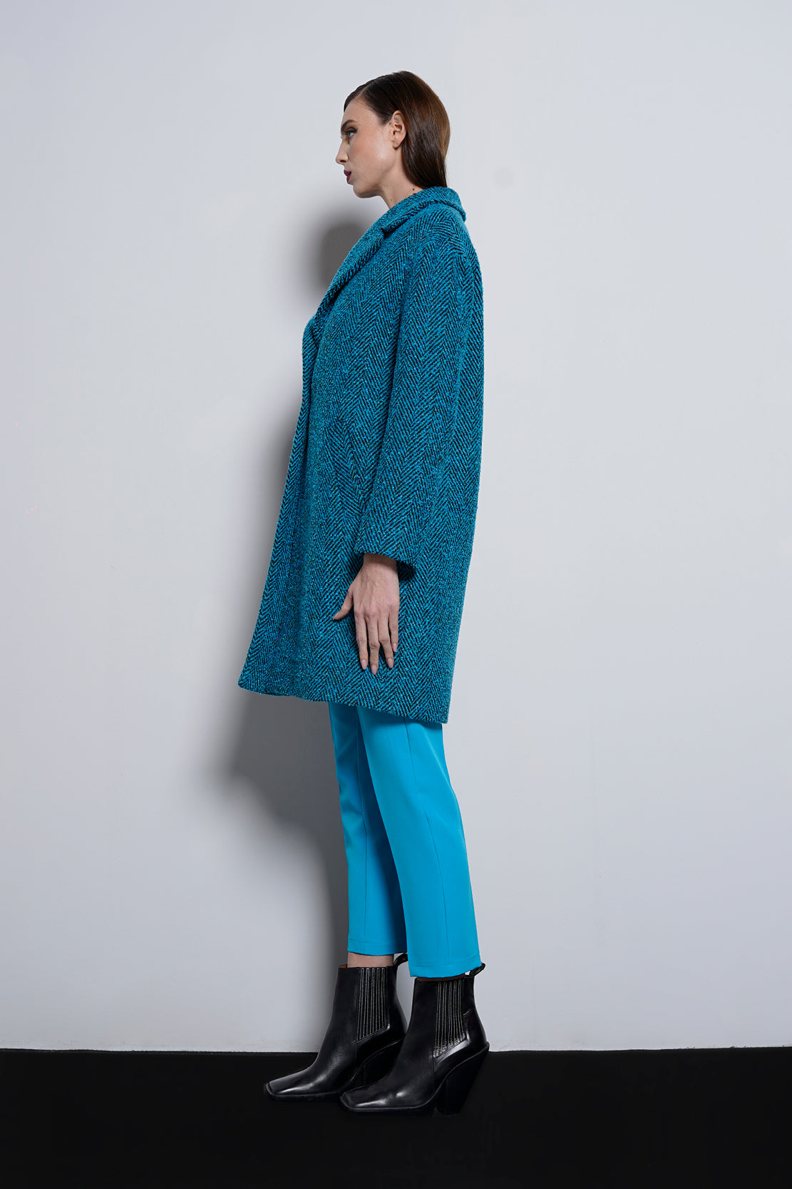 Cappotto tessuto spigato