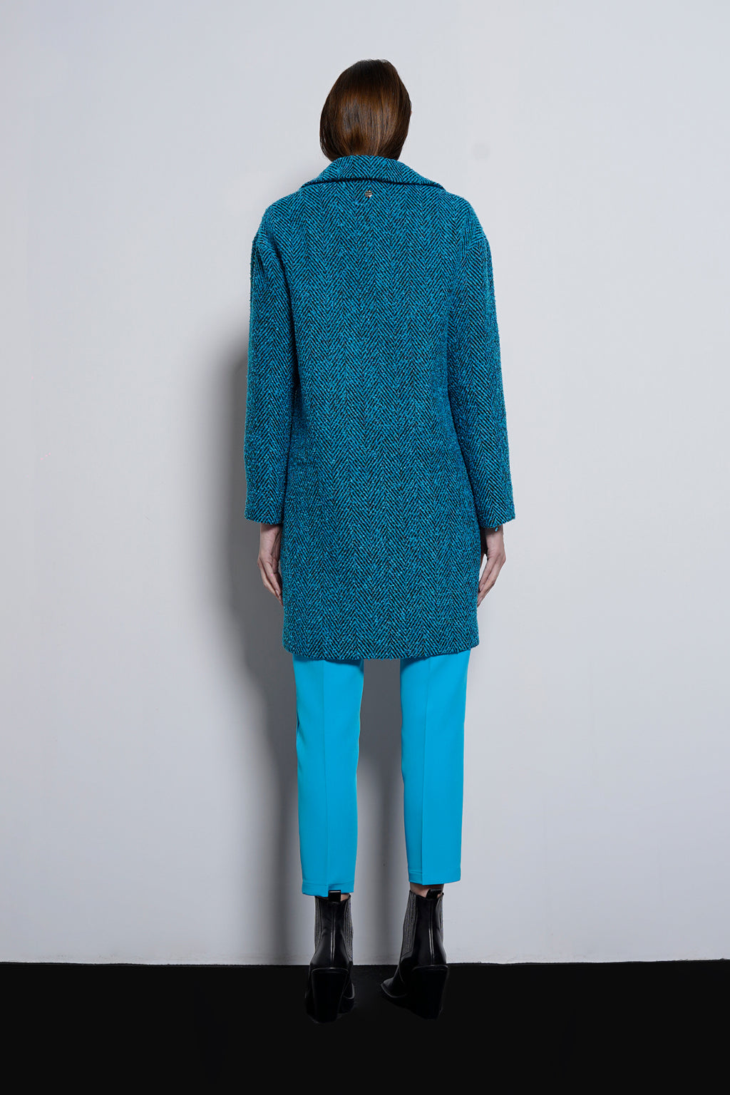 Cappotto tessuto spigato