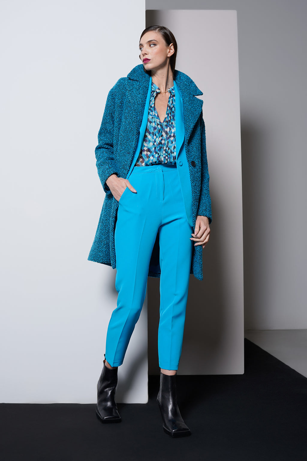Cappotto tessuto spigato