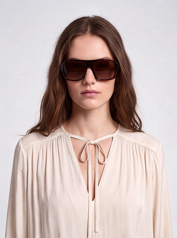 Blusa fluida con laccetti