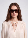 Blusa fluida con laccetti
