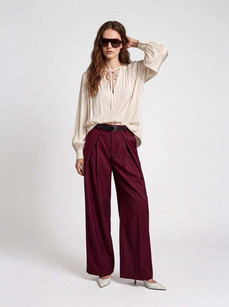 Blusa fluida con laccetti
