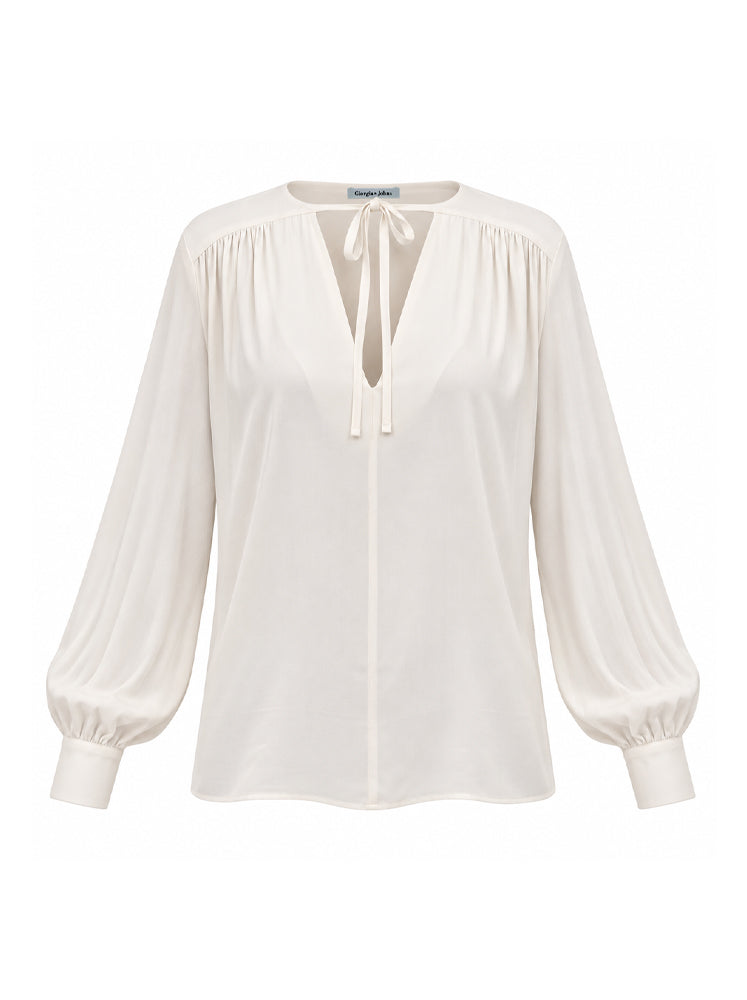 Blusa fluida con laccetti