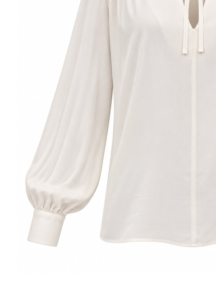 Blusa fluida con laccetti