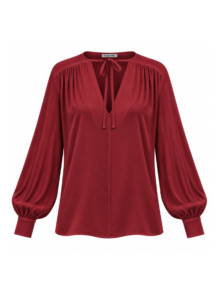 Blusa fluida con laccetti