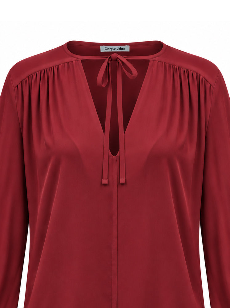 Blusa fluida con laccetti