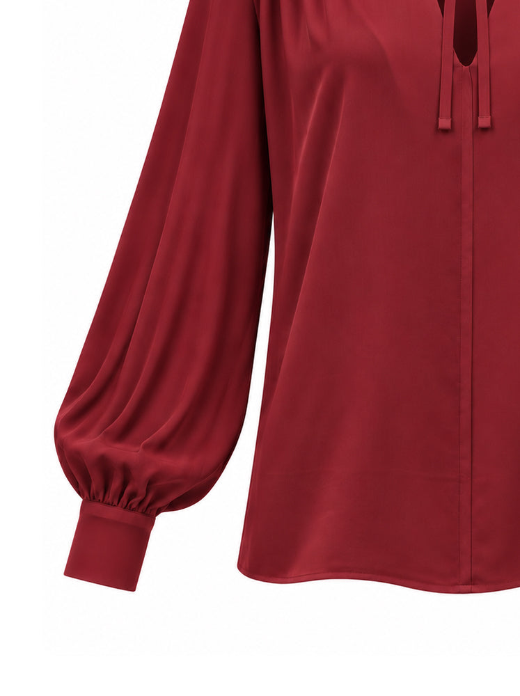 Blusa fluida con laccetti