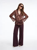 Blusa floreale scollo a V