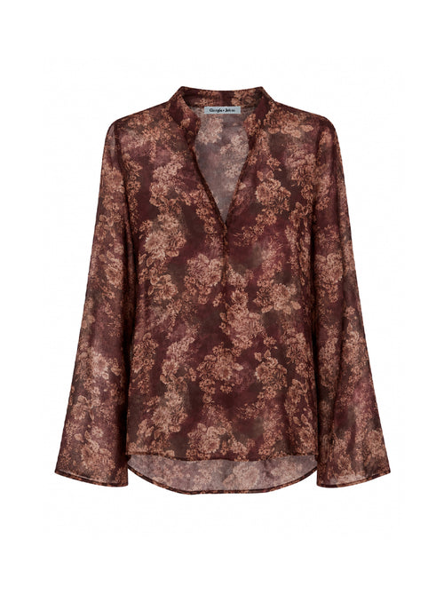Blusa floreale scollo a V