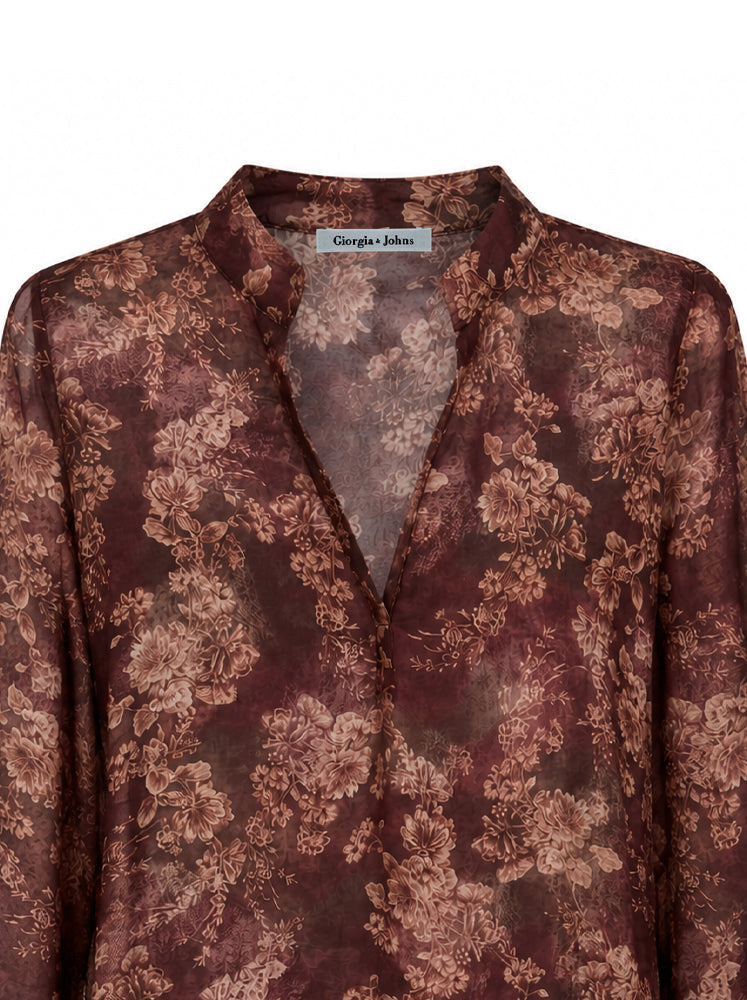 Blusa floreale scollo a V
