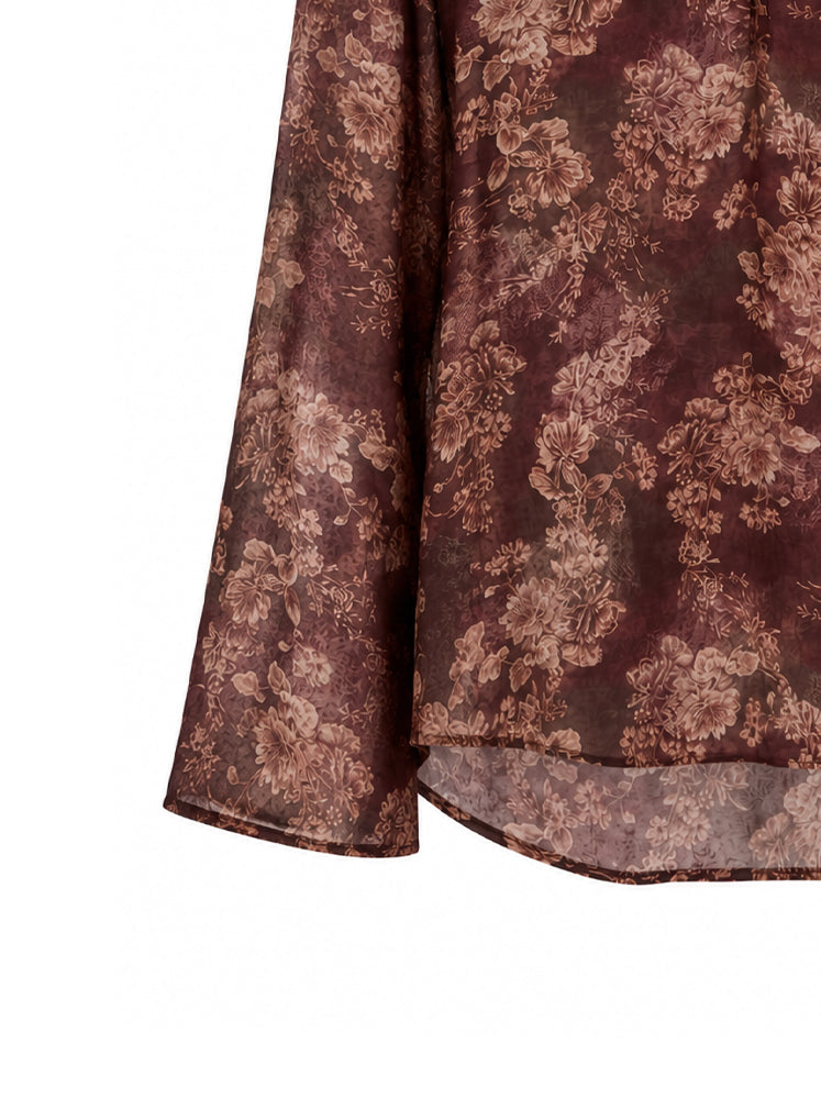 Blusa floreale scollo a V