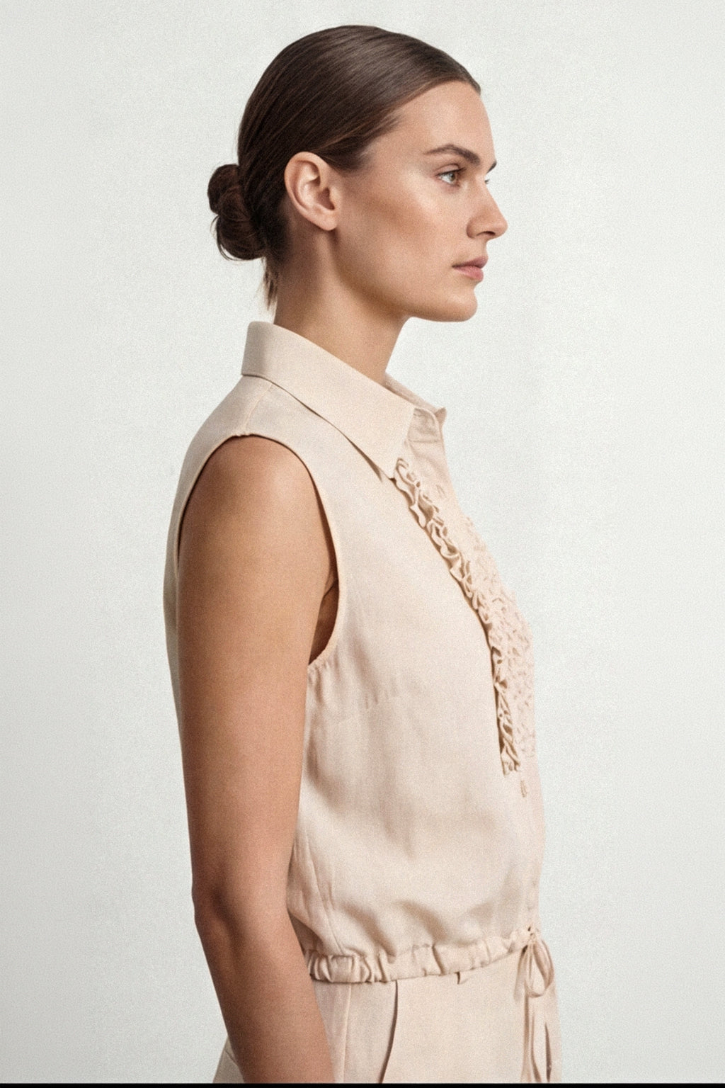 Blusa smanicata con coulisse