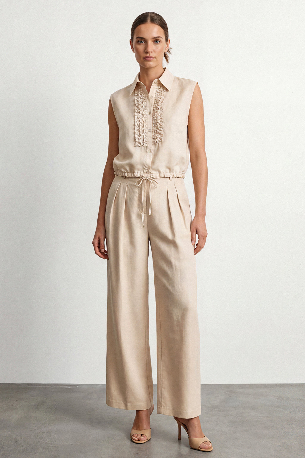 Blusa smanicata con coulisse