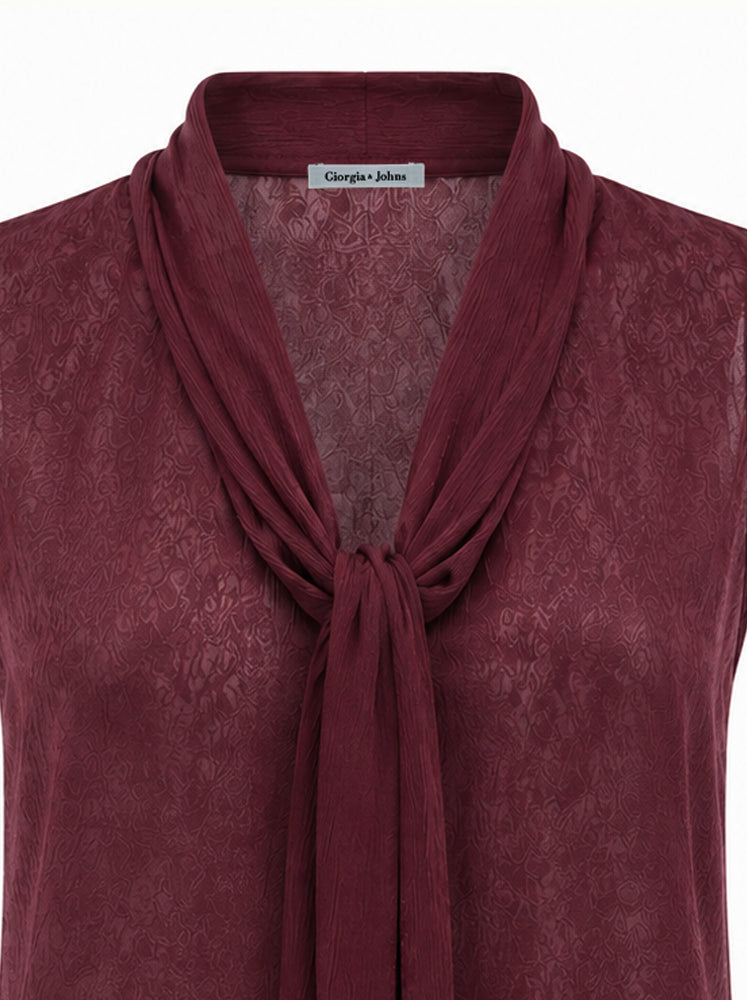 Top jacquard con fiocco