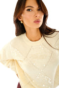 Maglione con paillettes