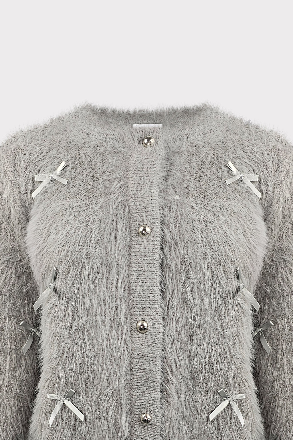 Cardigan con fiocchi