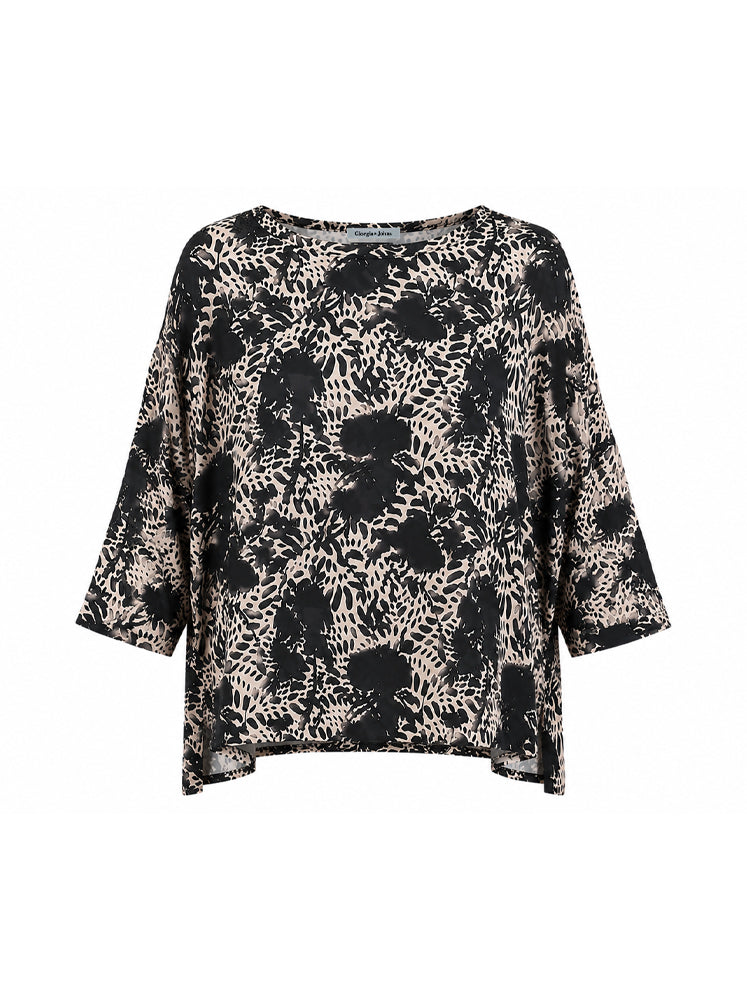 Blusa over stampa astratta
