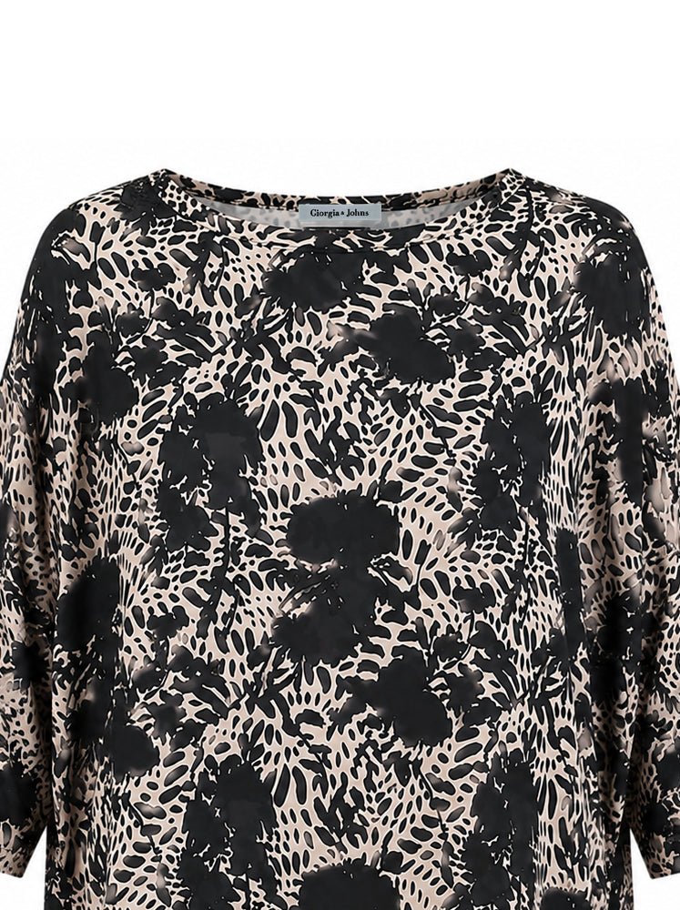 Blusa over stampa astratta