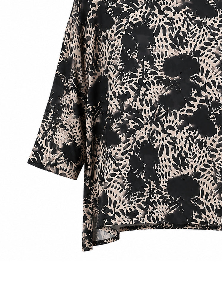 Blusa over stampa astratta
