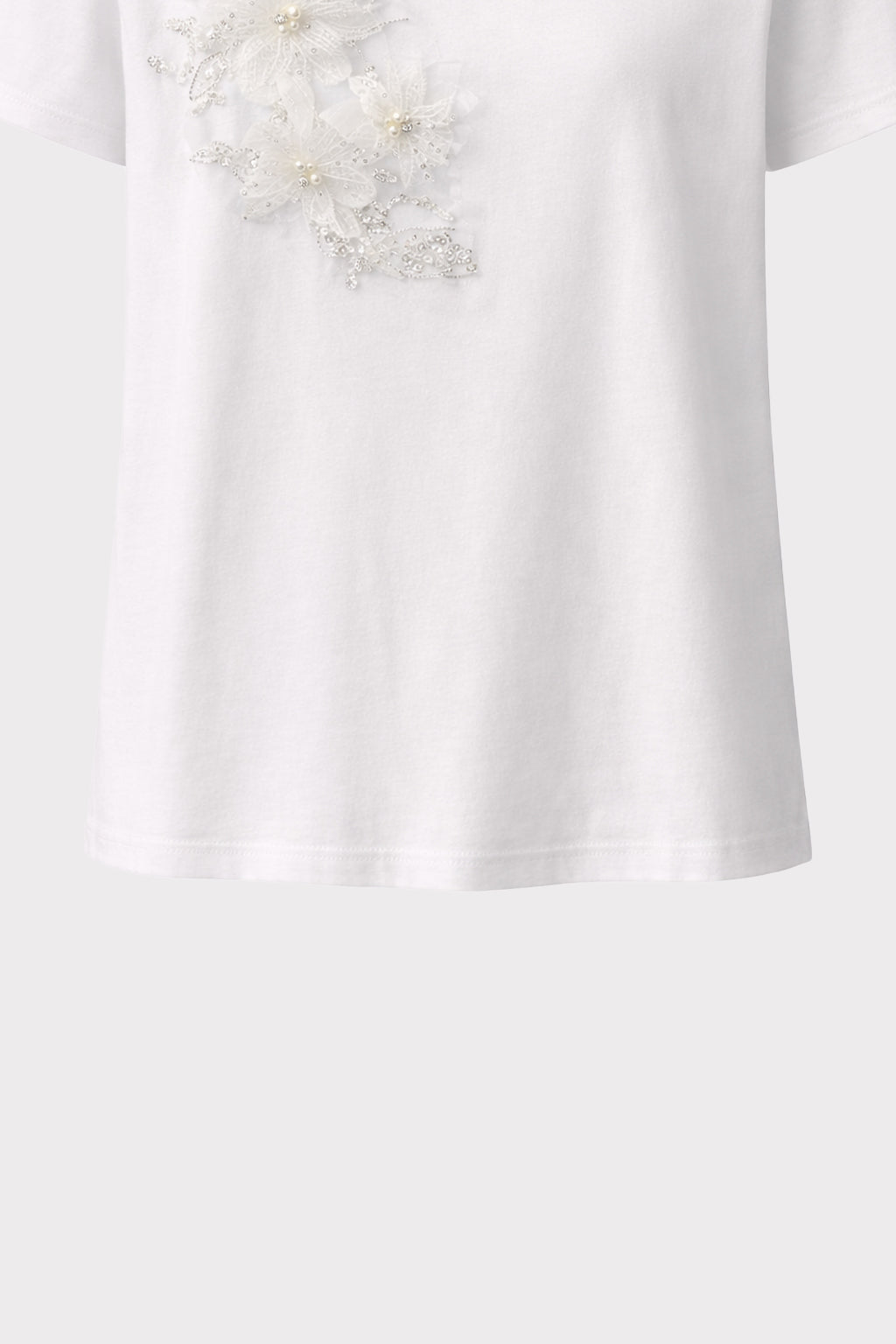 T-shirt con applicazione e perle